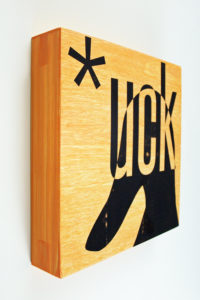 *UCK (10"x10"x2" xerography & acrylic on wood) by R.L. Gibson